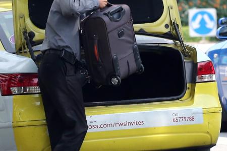 Man jailed for punching cabby over luggage