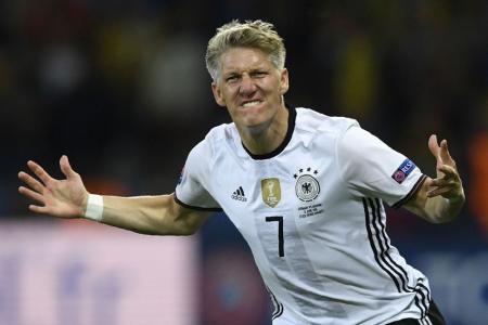 Schweinsteiger's back as Germany start with win