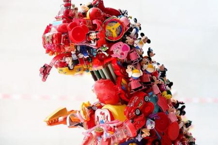Japanese artist creates dinosaur statues from old toys