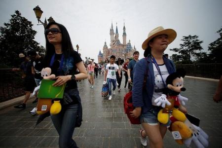 Thousands throng opening of Shanghai's Disney Resort