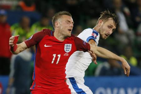 Wales usurp England to top Group B