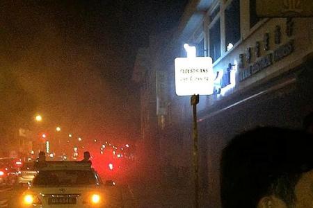 10 people flee fire in Geylang shop