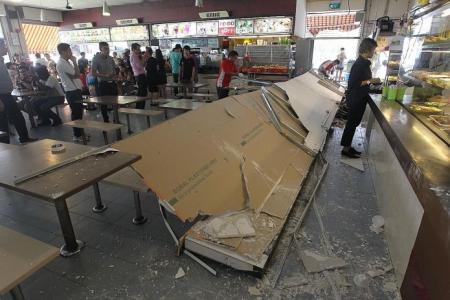 Signboard and parts of ceiling fall on woman
