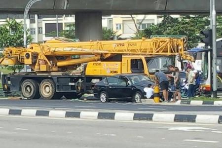 Mobile crane crashes into car, boy taken to hospital