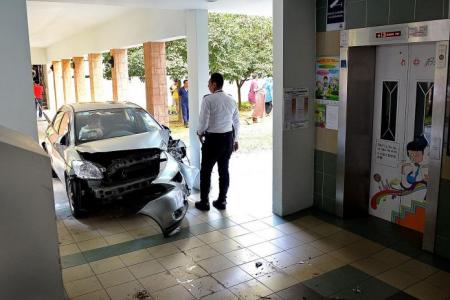 Car flies out of carpark, crashes at lift lobby