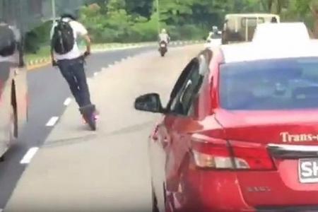 E-scooter rider dices with death by overtaking bus 