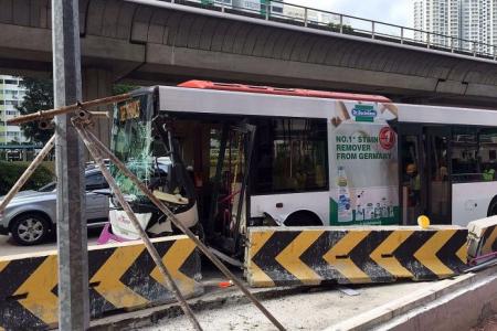 2 passengers hurt as SBS bus crashes into road divider in Clementi