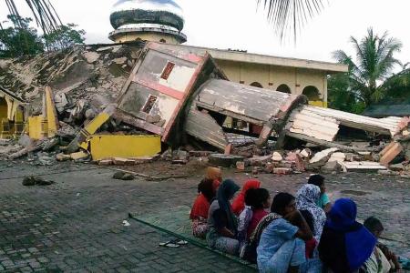Indonesia quake kills at least 97