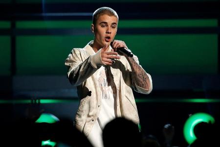 Bieber to face trial for assault