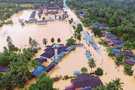 Almost 23,000 flee their homes as floods ravage north-eastern Malaysia