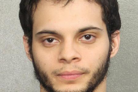 Airport shooter charged