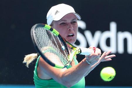 Caroline Wozniacki wilts in Sydney heat
