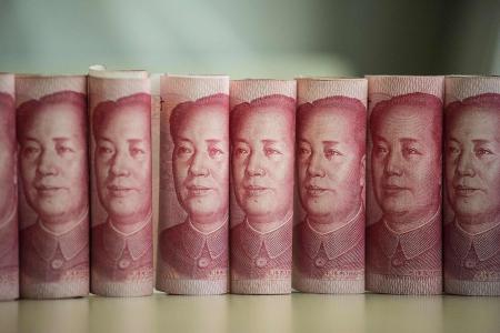 China should halt yuan intervention: Economist