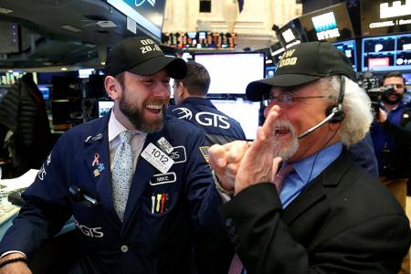 Dow breaks above 20,000 for first time