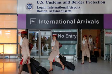 Airlines scramble to tweak crew rosters on US flights after travel ban