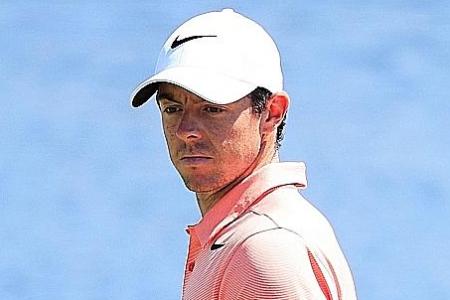 McIlroy fights back, Hoffman makes miracle putt