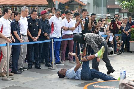 PM Lee: Learn to calm down terror victims