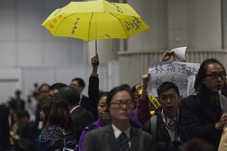 Hong Kong cops target activists