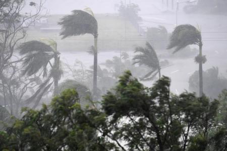 Thousands take shelter as 'screaming' cyclone hits Australia