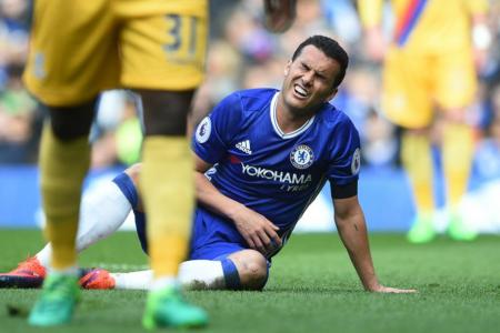 Chelsea&#039;s Pedro reacts after missing an opportunity to score