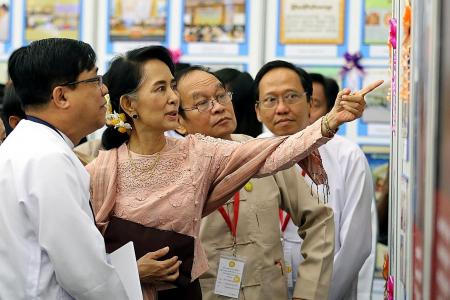 Suu Kyi calls for space to handle issue