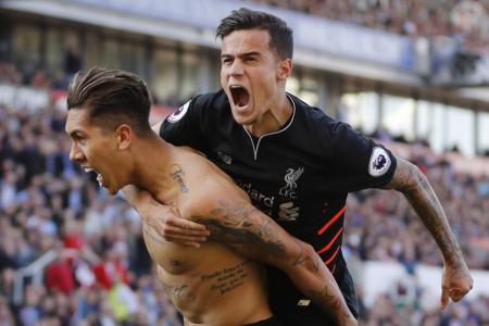 Liverpool&#039;s Roberto Firmino celebrates scoring their second goal with Philippe Coutinho