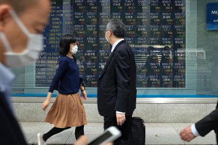 Asian stocks edge up as  US dollar regains traction