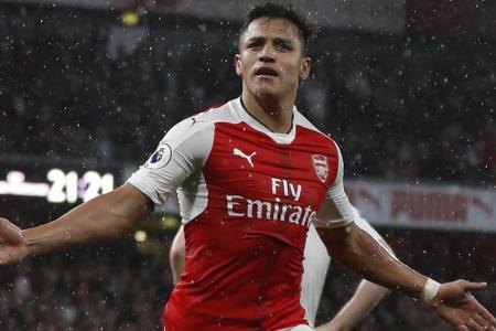  Arsenal&#039;s Chilean striker Alexis Sanchez celebrates scoring the second goal during the English Premier League football match between Arsenal and Sunderland