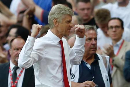 Arsene Wenger celebrates at the final whistle in the FA Cup final