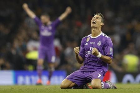 Real Madrid&#039;s Cristiano Ronaldo celebrates after winning the UEFA Champions League Final