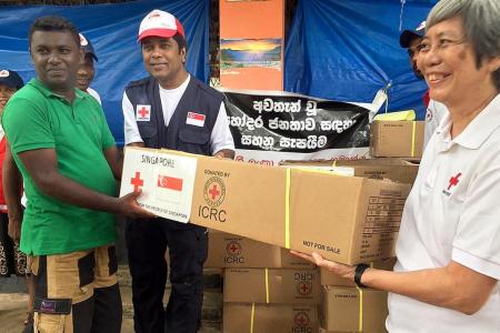 Red Cross volunteers help flood-hit Sri Lanka