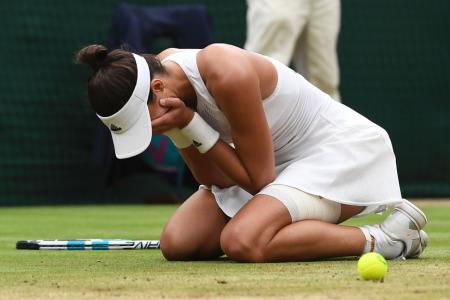 Muguruza stuns Venus to win first Wimbledon title