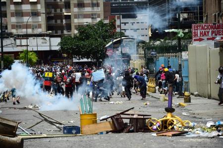 Venezuela shuts down as millions take to the streets