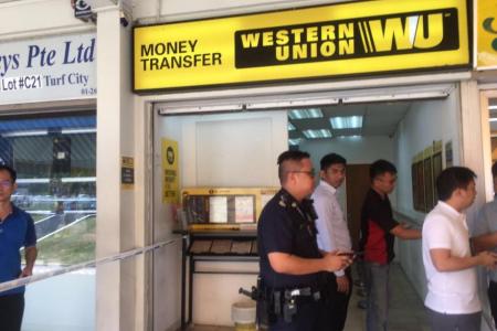 JUST IN: Armed robber still at large at Ubi Avenue