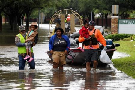 Devastated Houston reels as Storm Harvey hits Louisiana