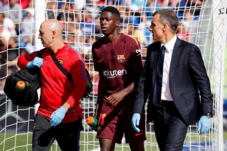 Barcelona's Dembele out  for four months