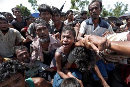 Suu Kyi should meet Rohingya Muslims, say UN human rights experts