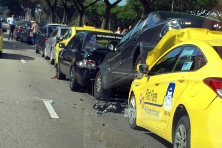 Seven taken to hospital after 12-car pile-up on KPE