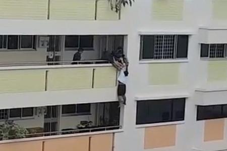 Maid rescued from ledge 
