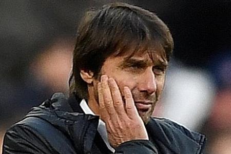 Chelsea manager Antonio Conte says title defence is over
