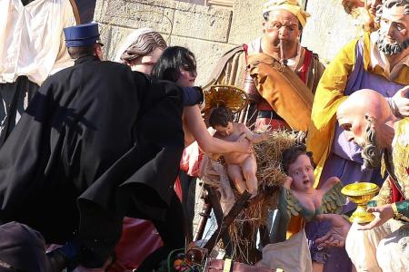 Feminist activist tries to snatch statue from Vatican Nativity scene