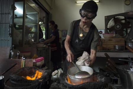 Thai street food cook feels heat of Michelin fame
