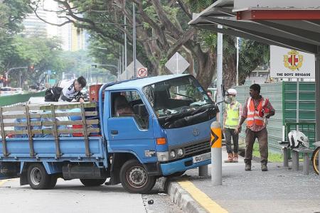 Lorry crashes into bus stop 