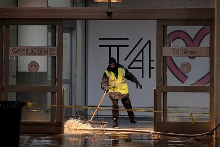 New York airport terminal flooded as brutal cold grips US East Coast 