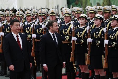 Macron urges China, EU to avoid pitfalls of protectionism