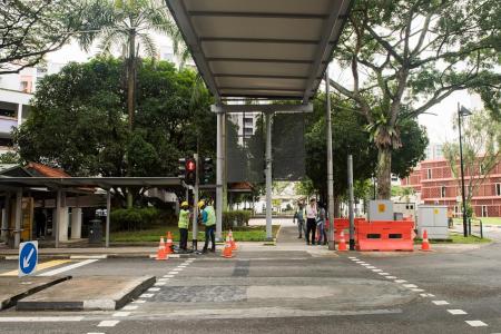 Unaligned sheltered linkway in Jurong West set right
