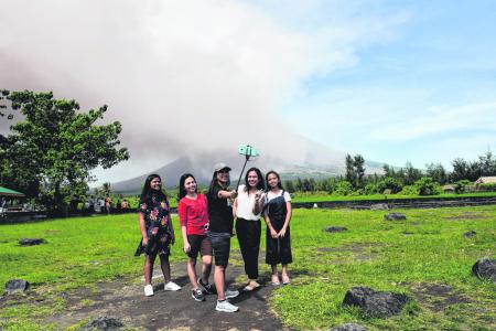 Erupting Mayon volcano sparks Philippine tourism boom