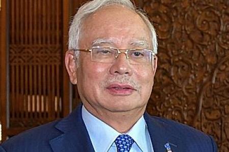 Malaysian PM Najib takes swipe at former leader
