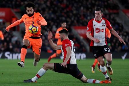 Liverpool go third after 2-0 win over Saints