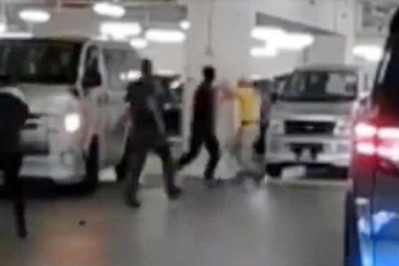 Three men arrested over brawl at Chinatown Point carpark
